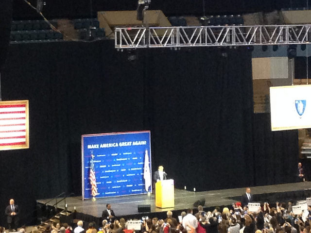 Donald Trump speaking before audience at rally